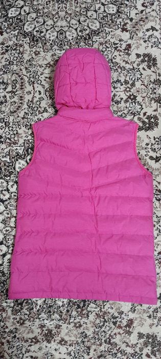 Женская жилетка, безрукавка.