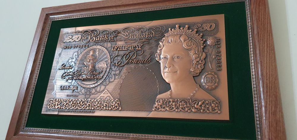 100$ и 50 фунт стерлинг купюра мисдан ясалган