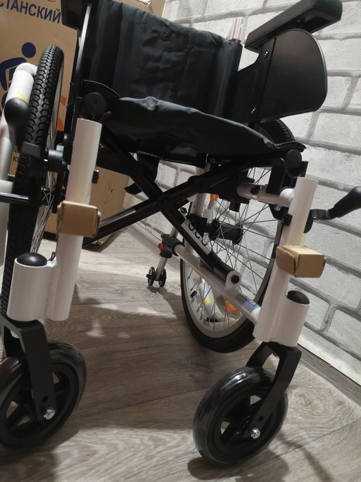 Инвалидная детская коляска
