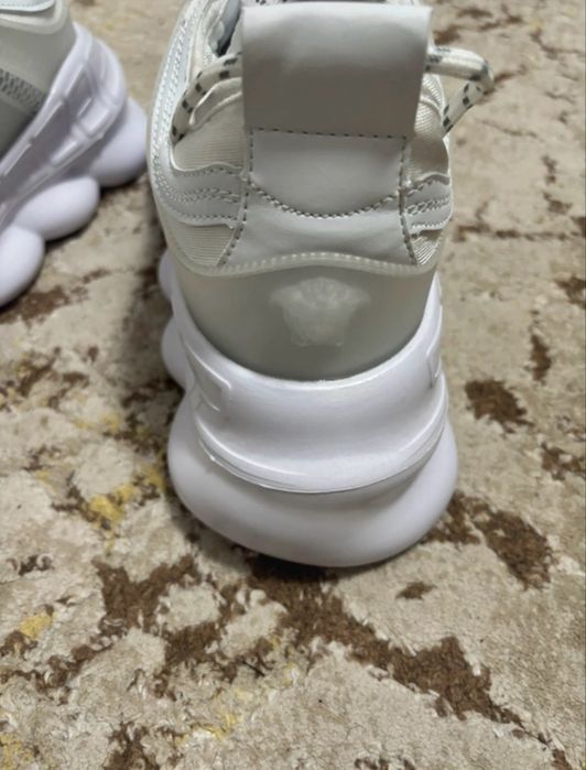 Versace chain reaction