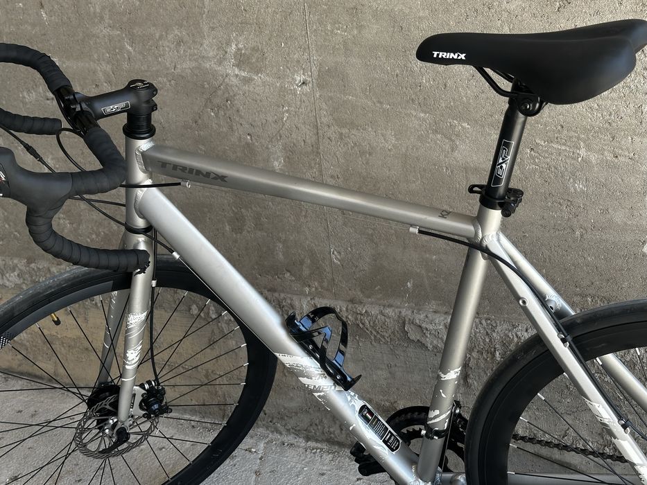Шоссейник trinx производства италия