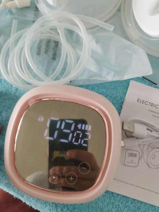 Электронный молокоотсос