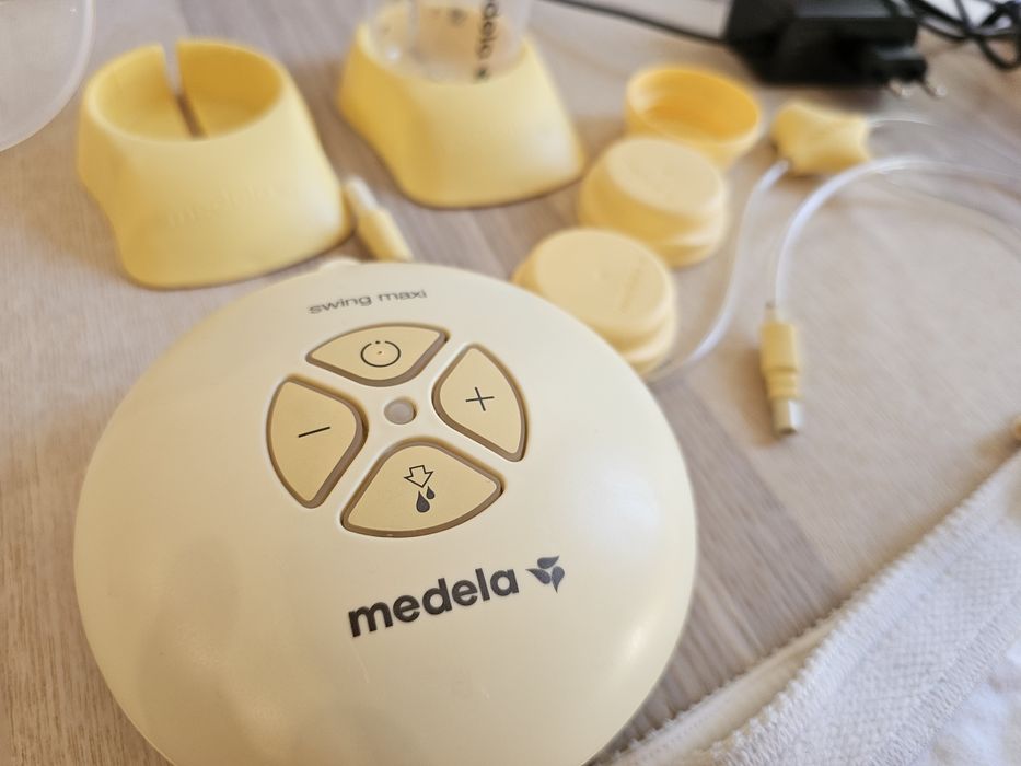 Двойна помпа за кърма Medela Swing Maxi + биберон Calma + подарък