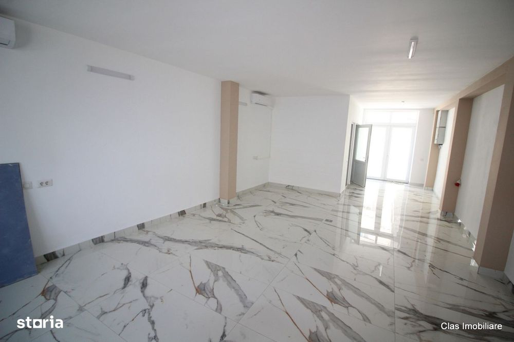 Spatiu Comercial Cladire pe colt cu 2 intrari si locuri de parcare !!