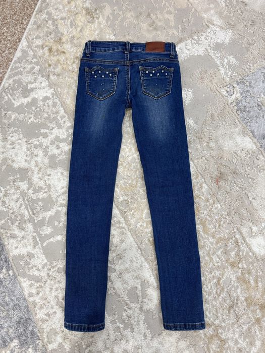 Продам джинсы для девочки