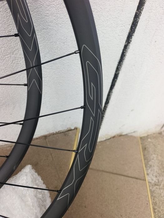 Капли Гравел Shimano GRX WH-RX570-TL Wheelset-12x100mm | 12x142mm - HG