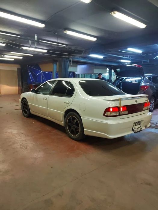 Бампер  ниссан цефиро а32