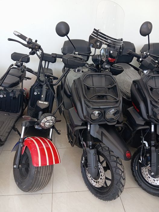 Скутр кваадрацикал