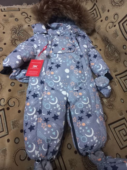 Продам комбинезоны новые