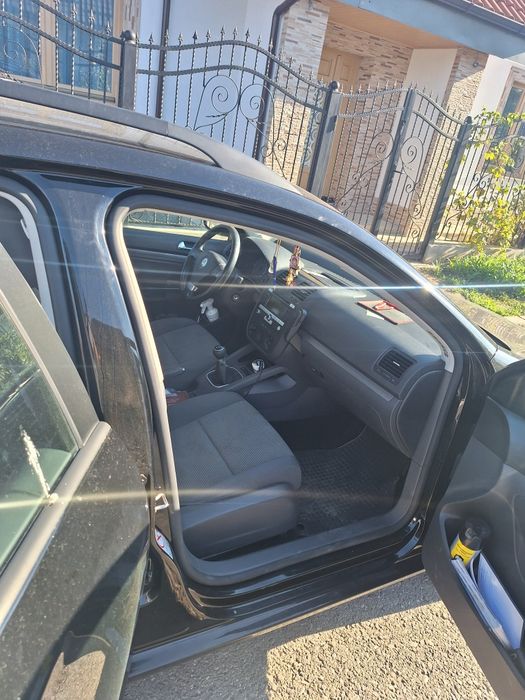 Volkswagen Golf 2009 benzină, 1.408 € — imagine 3