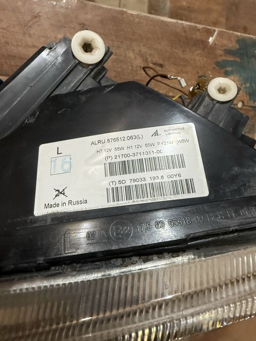 Фара приора 1 левая оригинал бош