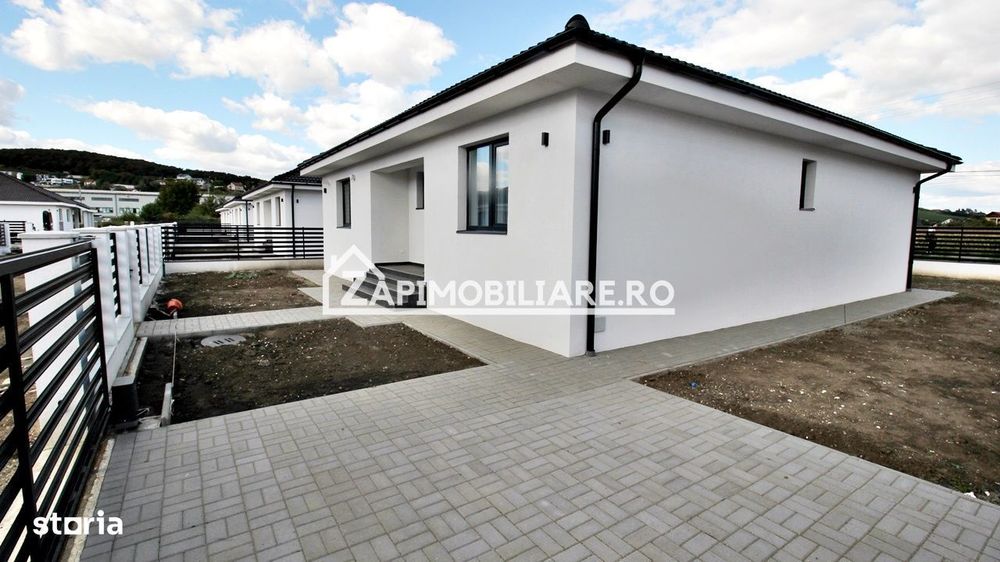 Casă la cheie pe 1 nivel 4 camere 2 băi,145 mp,500 mp teren