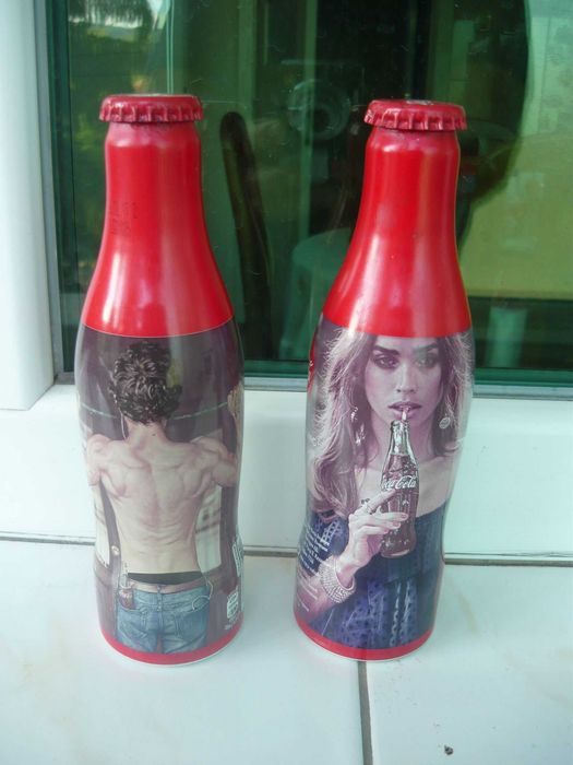 Бутилки кока кола