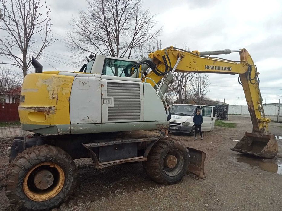 Vand/schimb Excavator New Holand MH City 16t
