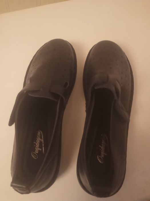 Новые кожаные туфли