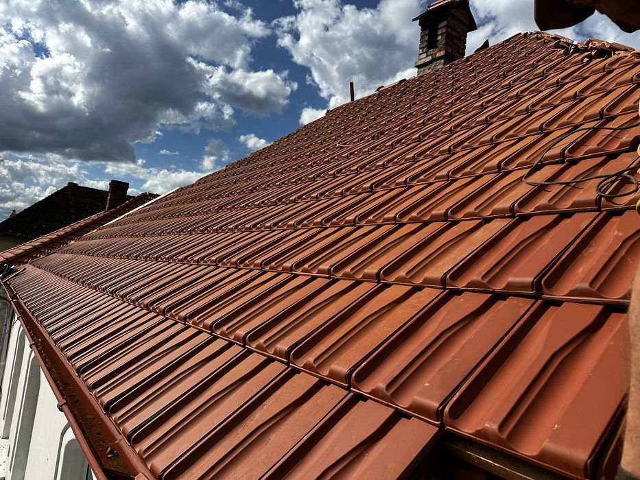 Reparatii acoperisuri montaj tigla metalica dulgherie terase izolatii