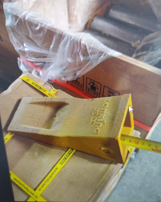 Зубья, коронки адаптеры ковша