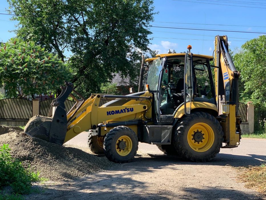 Inchiriez buldoexcavator Komatsu wb 97r