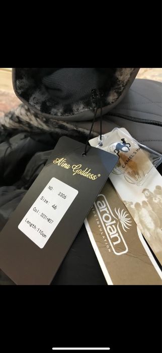 Продам пуховик пальто