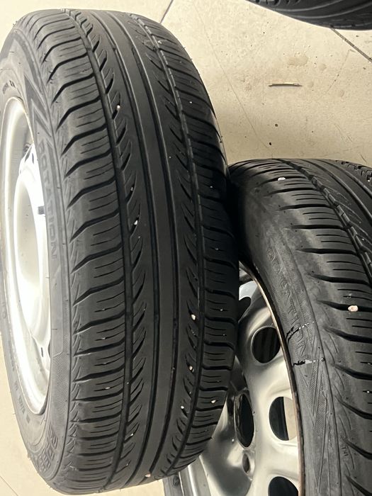 Продам резину с дискамина 14..