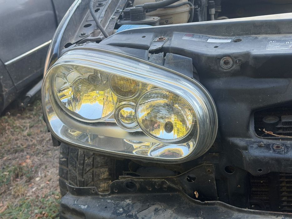 Motoras faruri Golf 4