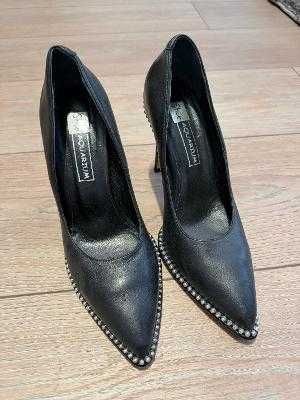 Обувки на висок ток