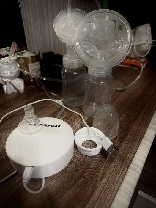 Электрический молокоотсос