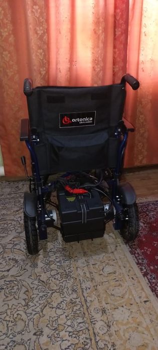 Инвалидная коляска с электроприводом