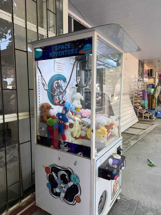 Хватайка. Кран апарат. Юмшоқ ўйинчоқлар сотиш қурилмаси