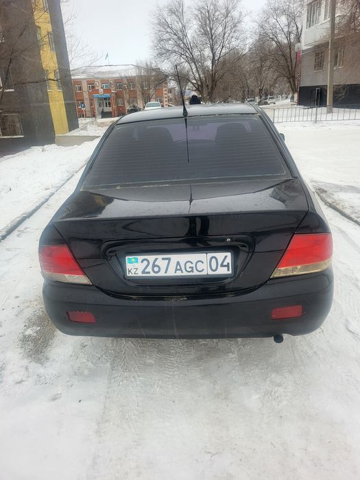 Митсубиси лансер9 2009год