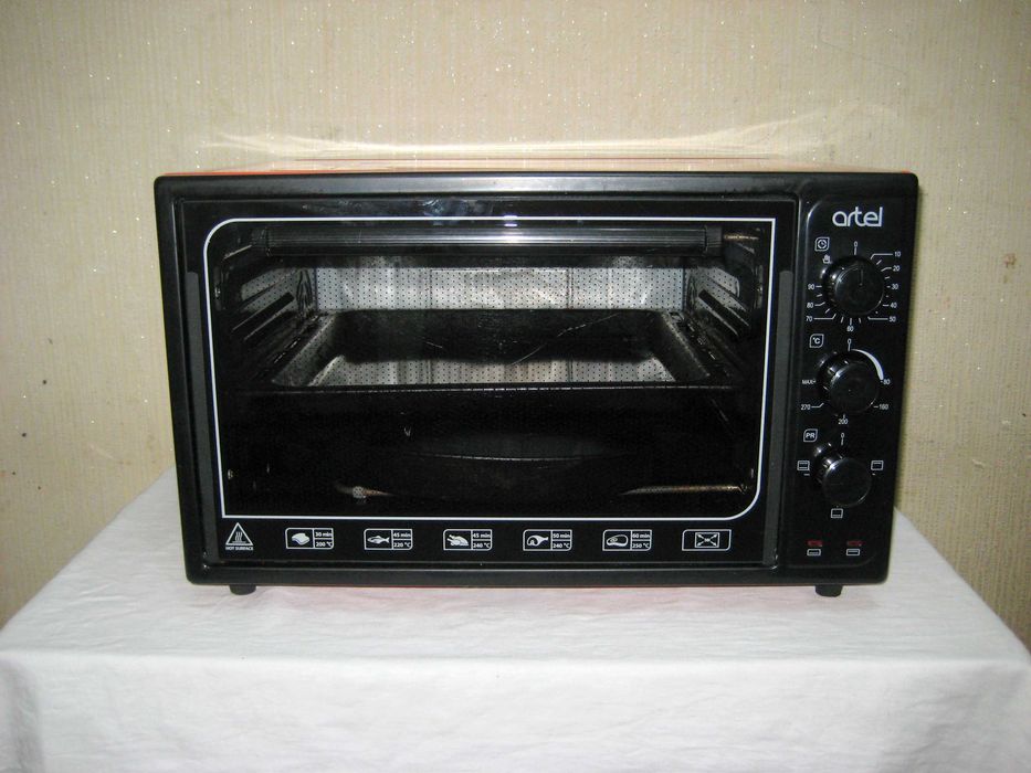 Печь духовка 40лт деярли янги куп ишламаган почти новая малоползвано!