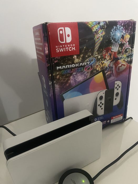 Vand nintendo switch oled cu mariokart deluxe