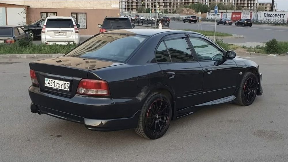 Mitsubishi Galant 8 передний бампер Dolphin