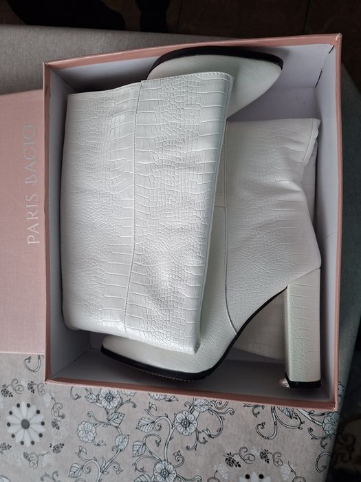 Продам сапоги новые