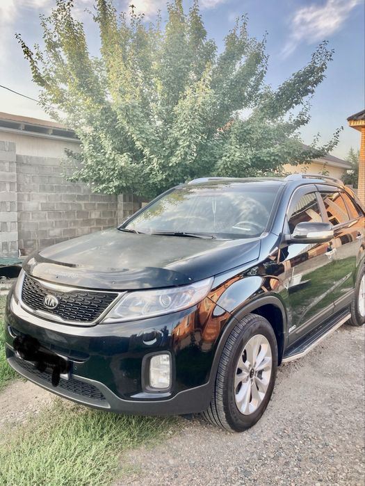 Киа соренто 2014