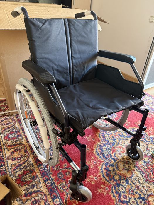 Инвалидная коляска