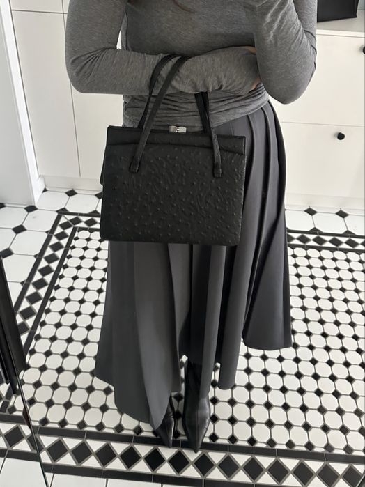 Юбка миди длины