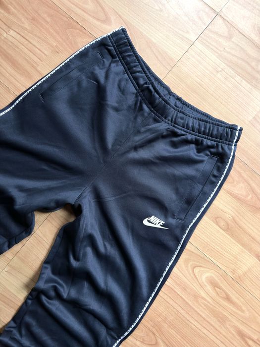 Pantaloni training pants joggers tapered leg Nike blue poliester