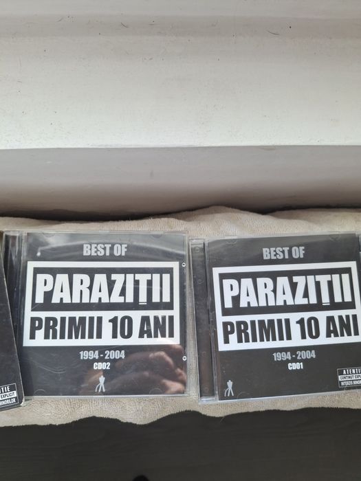 C.D Parazitii ,album 1 si 2