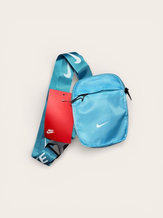 Birsetă Nike culoare albastru deschis
