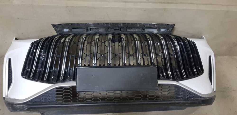 Бампер и решётка от Jetour x50.