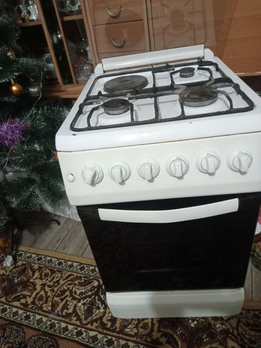 Продам комбинированую плиту