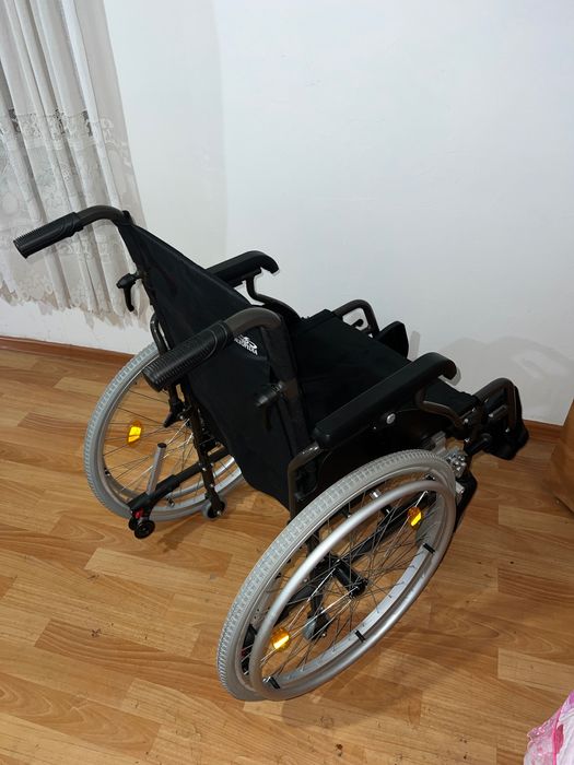 Инвалидная коляска