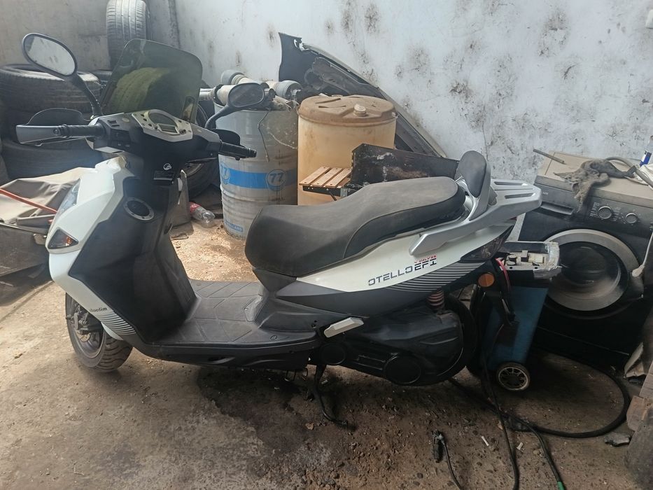 Скутер 125 кубика