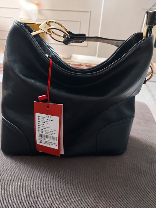 Кожаная      сумка