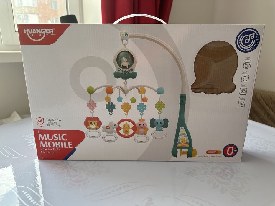 Продам детский музыкальный мобиль с подсветкой