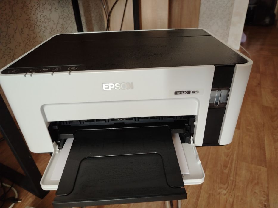 Продам чёрно белый принтер епсон M1120 новый