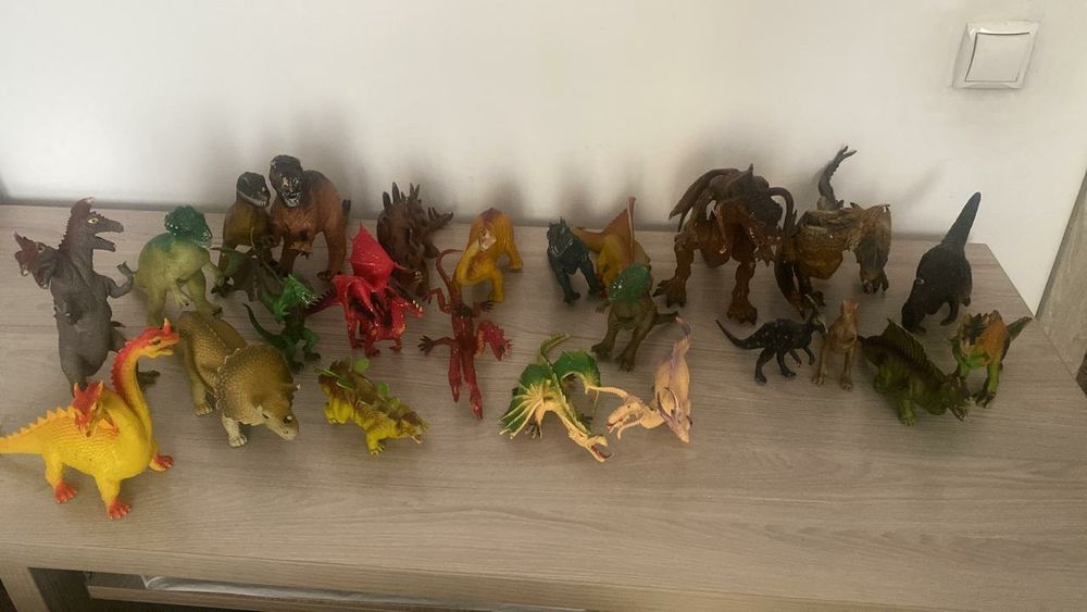Игрушки колекция динозавров