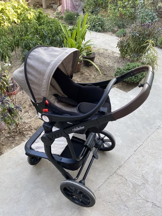 Коляска (лежачая, сидячая + люлька в машину)