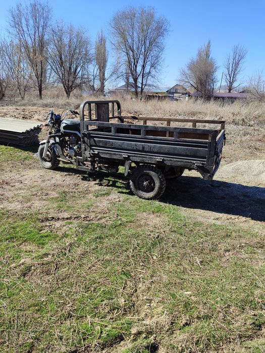 Трехколесный мотоцикл